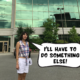 Meggie, in her red, white, and blue plaid shirt and white shorts, is standing in front of an office with a blue and green glass building. In a comic text speech bubble, Meggie says "I'll have to go somewhere else!" Club Penguin Headquarters, Kelowna, British Columbia, Canada