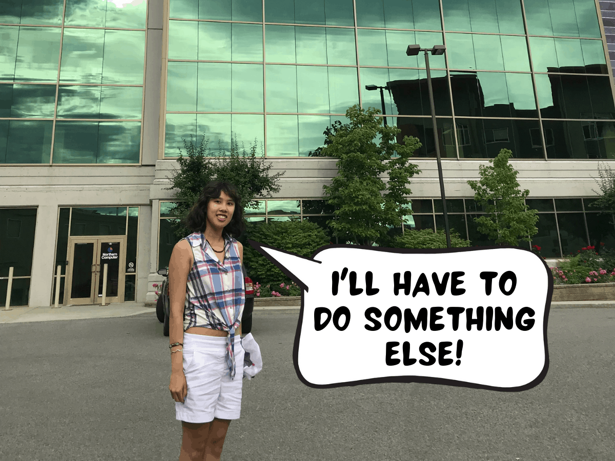 Meggie, in her red, white, and blue plaid shirt and white shorts, is standing in front of an office with a blue and green glass building. In a comic text speech bubble, Meggie says "I'll have to go somewhere else!" Club Penguin Headquarters, Kelowna, British Columbia, Canada