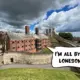The red-bricked building of the Victorian-era prison. A comic text speech bubble is pointing to a window in the prison, saying, "I'm all by my lonesome." On the grounds of Lincoln Castle, Lincoln, Lincolnshire, England, United Kingdom.